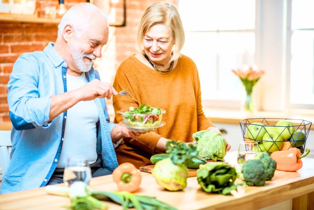 Couple making a nutritional meal with vegetables